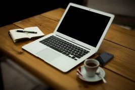 Laptop, coffee and notebook- Link to SWDTP Blogs page