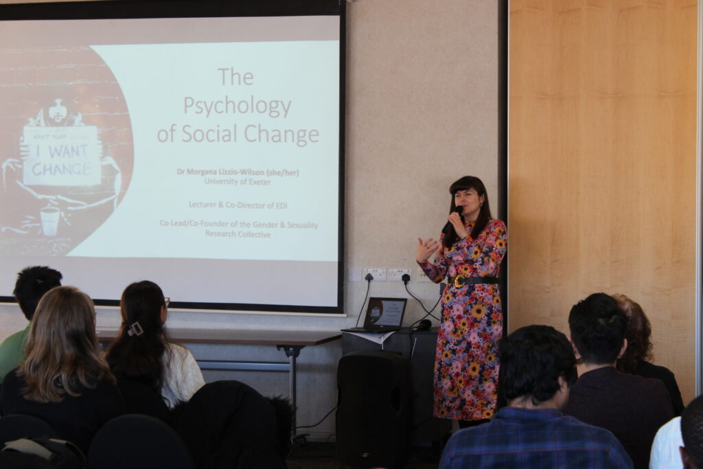 Morgana presenting their talk on Achieving and maintaining progress social change