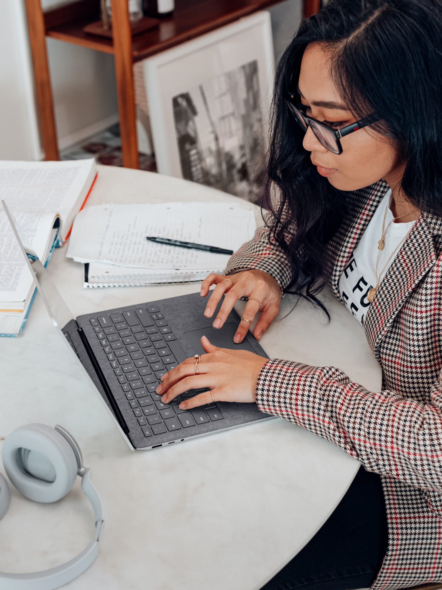 Person using a laptop at a desk